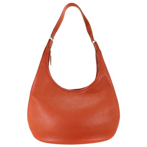 Hermès Rust Clemence Gao Hobo For Sale at .